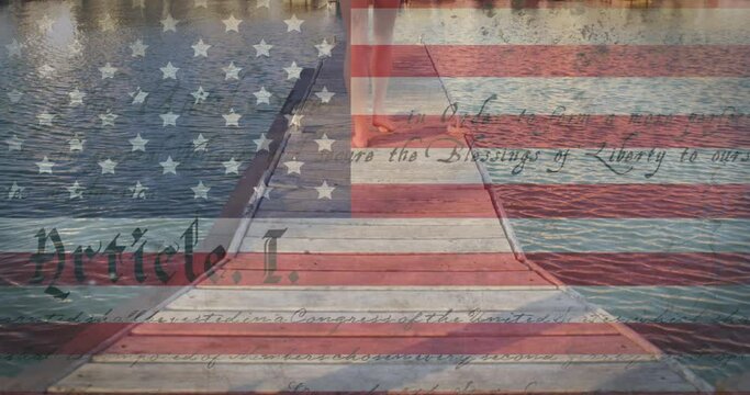 Constitution text and american flag against low section of caucasian woman walking on wooden pier