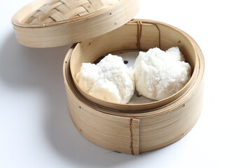 steamed fresh char siew bao marinated pork meat Chinese bun in bamboo basket dim sum menu