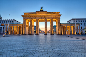 The back side of the famous Brandenburg Gate in Berlin before sunrise