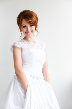 Portrait of the bride with a happy toothy smiling face