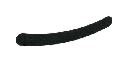 black abrasive nail file isolated on white background. flexible emery board used in manicure and pedicure