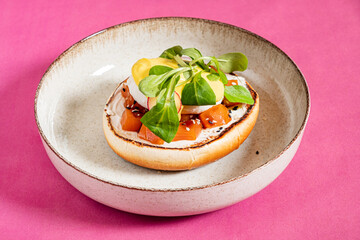 sandwich with salmon and herbs