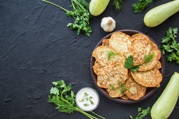 A healthy breakfast of zucchini pancakes. Creative atmospheric decoration