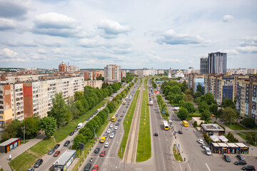 Fototapeta na wymiar Aerial view on Sykhiv, the largest residential area in Lviv, Ukraine from drone. Chervonoyi Kalyny Avenue