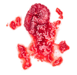 Smashed raspberries isolated on white