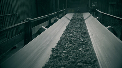 Industrial belt conveyor moving raw materials from mine