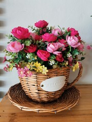 Obraz na płótnie Canvas beautiful colorful flowers in a basket