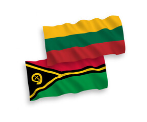 National vector fabric wave flags of Lithuania and Republic of Vanuatu isolated on white background. 1 to 2 proportion.
