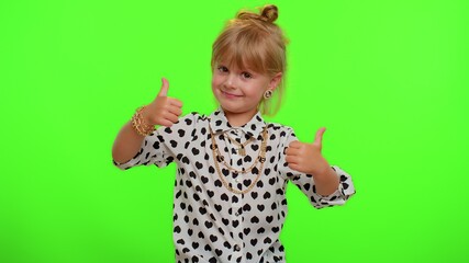 I love it. Happy cheerful blonde teen kid child girl greatly approves your suggestion, shaking head approvely, satisfied with good quality work, like proposal. Young children on chroma key background