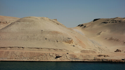 Fototapeta na wymiar sand dunes and sea, Suez canal, Egypt