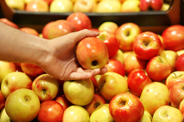 Man buying fruits at the market