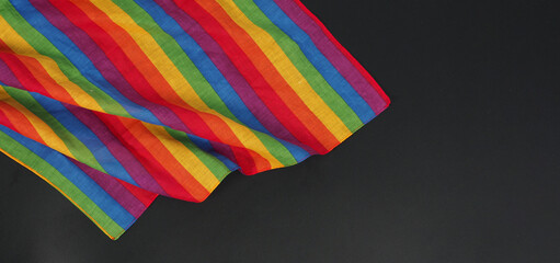 Fototapeta premium Rainbow handkerchief isolated on black background.