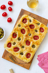Focaccia with tomatoes and olives. Vegetarian food. Italian food.