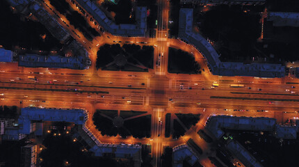 Hyperlapse aerial view of cars moving around the intersection