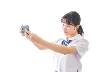 スマホを使う学生