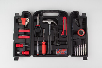 Black tool box with instrument and tools isolated on white background