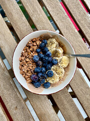 Bowl of Homemade Granola with Yogurt, Fresh Berries and Chia Seeds