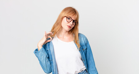 pretty red head woman looking arrogant, successful, positive and proud
