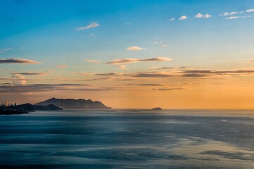 View of Benidorm on the Mediterranean Sea at sunrise from an old watchtower in El Campollo, Alicante Spain