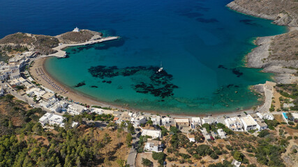 Aerial drone photo of beautiful twin bay, beach and small village of Kapsali  below iconic castle of Kythera island, Ionian, Greece