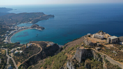 Obraz premium Aerial drone photo above iconic medieval castle and main village of Kithira island overlooking beautiful double bay and beach of Kapsali, Kythira island, Ionian, Greece