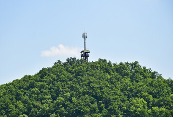 Fototapeta na wymiar Lookout tower with antennas in the mountain bukk, Hungary