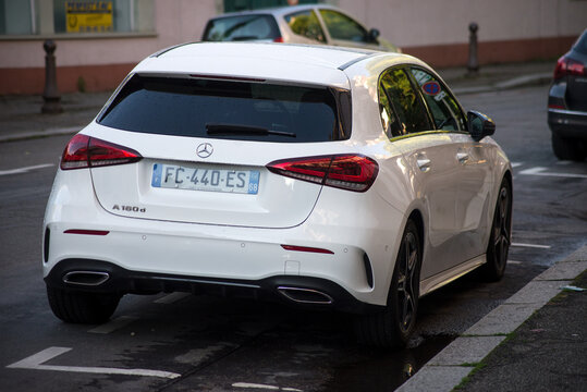 Mulhouse - France - 24 June 2021 - Rear view of white Mercedes A180 parked in the street