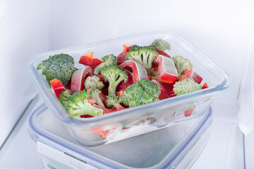 Open fridge full of fresh fruits and vegetables