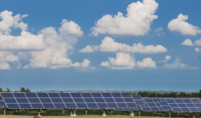 Solar panels on the sky background. Solar power plant. Blue solar panels. Alternative source of...