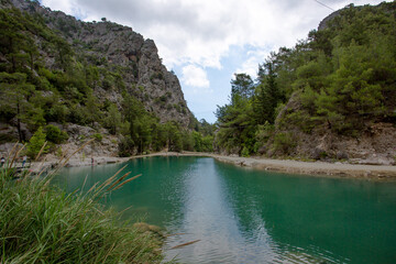 Travel through the Goyniuk Canyon. Beautiful places in Turkey. Mountain river and rocks in Kemer.