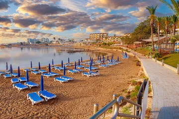  Cyprus panorama . Bird's eye view of Protaras. Beach holidays in Mediterranean. Kalamies beach in Protaras city. Beach with blue sunbeds and umbrellas. Sandy coast of Cyprus. Panorama Protaras © Grispb
