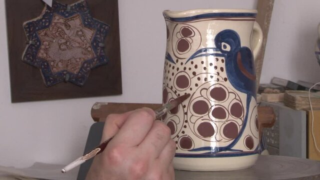 Process of making a ceramic piece.