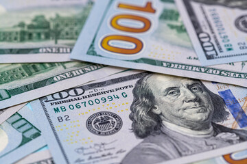 Close up of one hundred US dollar banknotes. Money background. Financial, business, investment and economical concept.