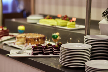 Turkish colorful desserts for picking up from buffet for hotel system of all-inclusive. Copy space