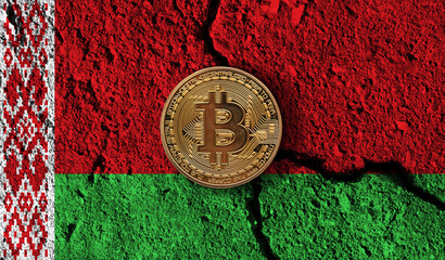 Bitcoin crypto currency coin with cracked Belarus flag. Crypto restrictions