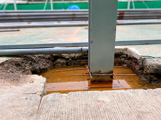 The rod of steel pier were assembled in an underground pit be flooded from rain. For the foundation...