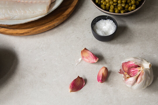 Garlic and salt on table