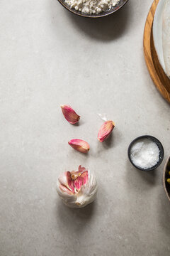 Garlic and salt on table