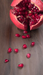 Fresh Pomegranate, rich in natural antioxidants. Concept of red fruits, vitamins and natural antioxidants to the skin for beauty.
