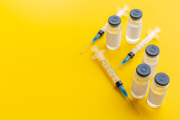 Medicine bottle for injection. Coronavirus vaccine ampoules with syringe