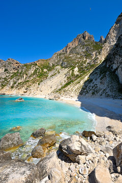 The spectacular Aspri Ammos beach on the rocky southwest coast of the Greek island of Othonoi in the Ionian Sea