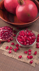 Fresh Pomegranate, rich in natural antioxidants. Concept of red fruits, vitamins and natural antioxidants to the skin for beauty.