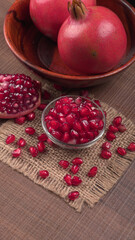 Fresh Pomegranate, rich in natural antioxidants. Concept of red fruits, vitamins and natural antioxidants to the skin for beauty.