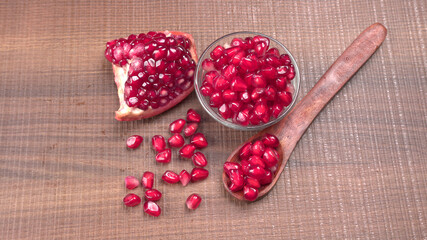Fresh Pomegranate, rich in natural antioxidants. Concept of red fruits, vitamins and natural antioxidants to the skin for beauty.