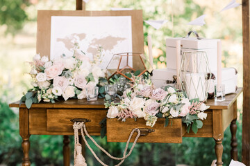 Decoration of a wedding with paper details and gentle fresh flowers