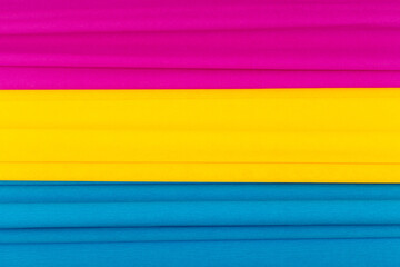 Pansexual pride flag made of corrugated paper with stripes. Concept of Lgbtqia, pansexual community, respect and sexual minorities 
