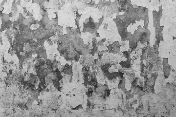 Background with wall texture with peeling old white paint.