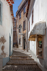 Fototapeta na wymiar narrow street in old Portuguese town