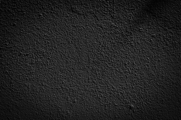 Background with dark textured cement wall texture.
