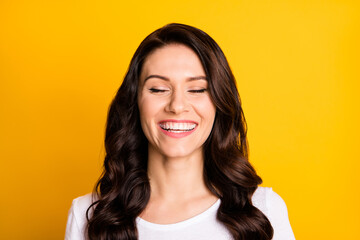 Close-up portrait of lovely cheerful dreamy wavy-haired girl closed eyes good mood isolated over bright yellow color background